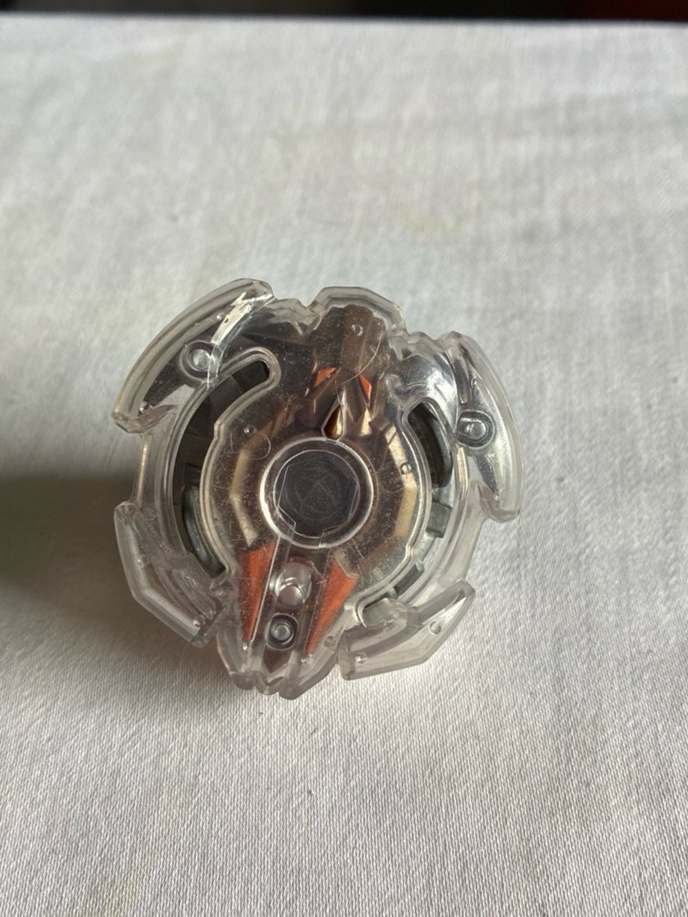 Beyblade Clear Plastic Beyblade Top with Metallic Orange Core